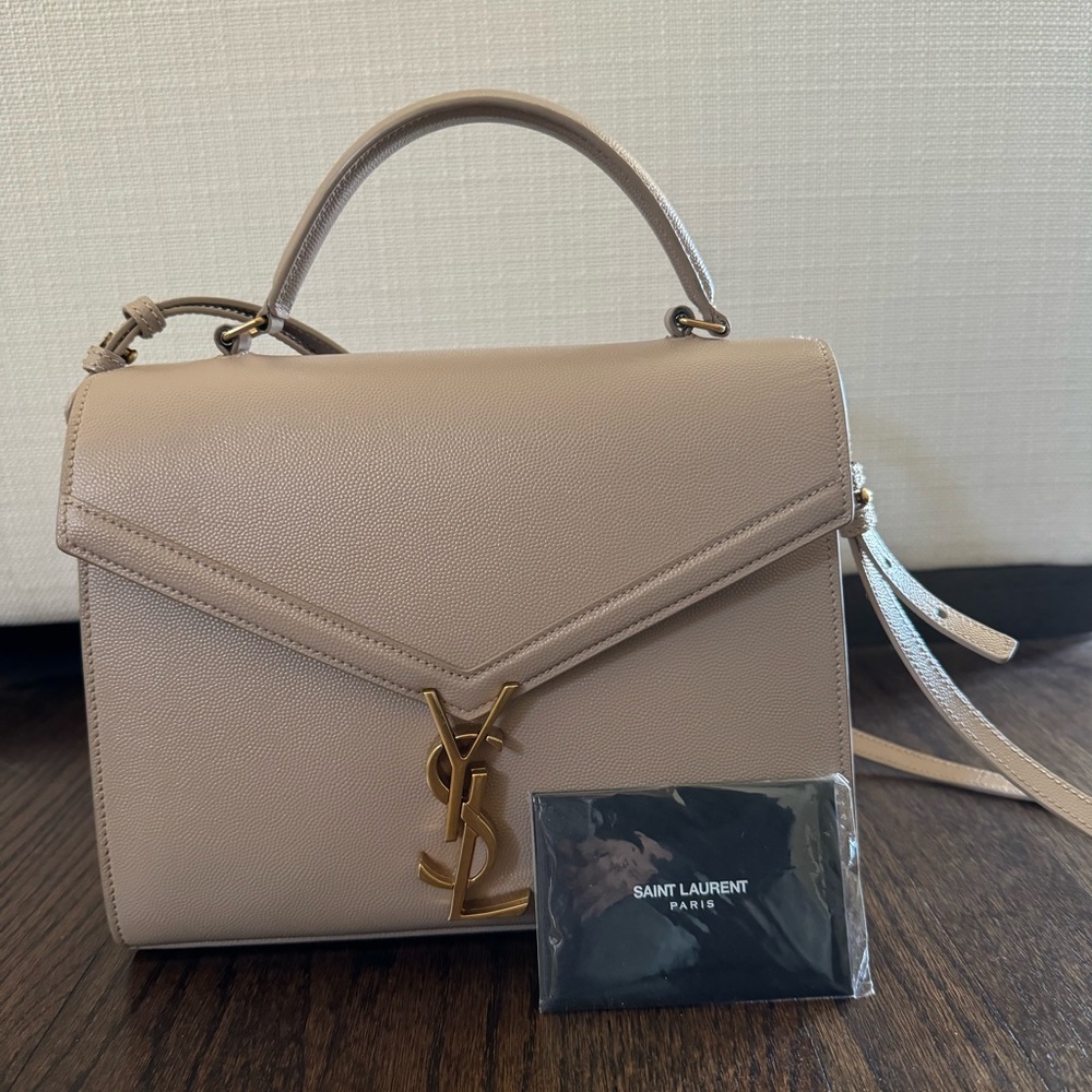 Cassandra Medium Top Handle Bag In Grain De Poudre Embossed Leather